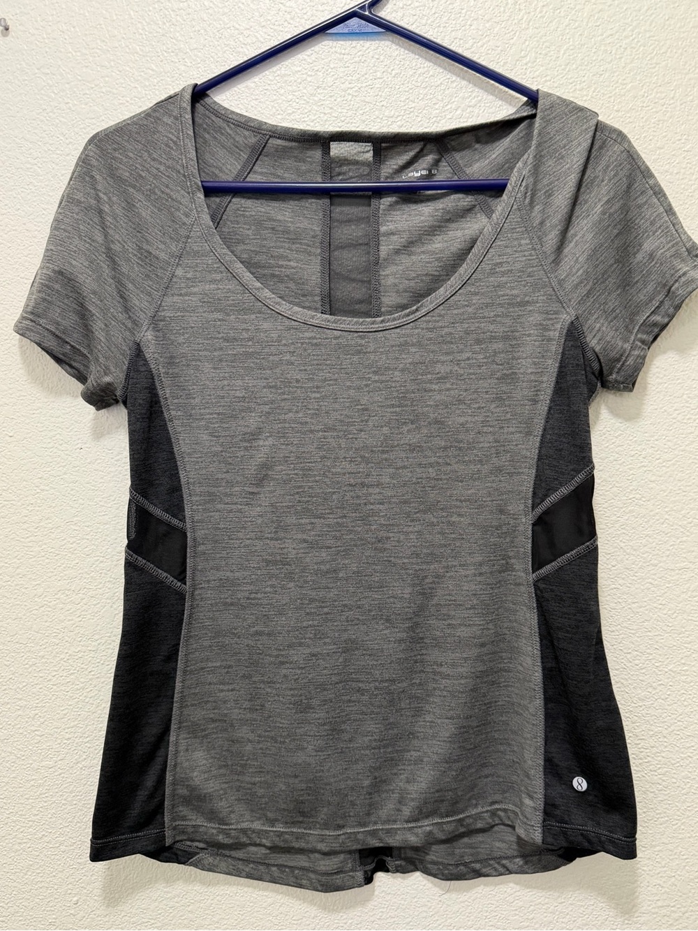 Layer 8 gray and black athletic short sleeve t-shirt with mesh back, small